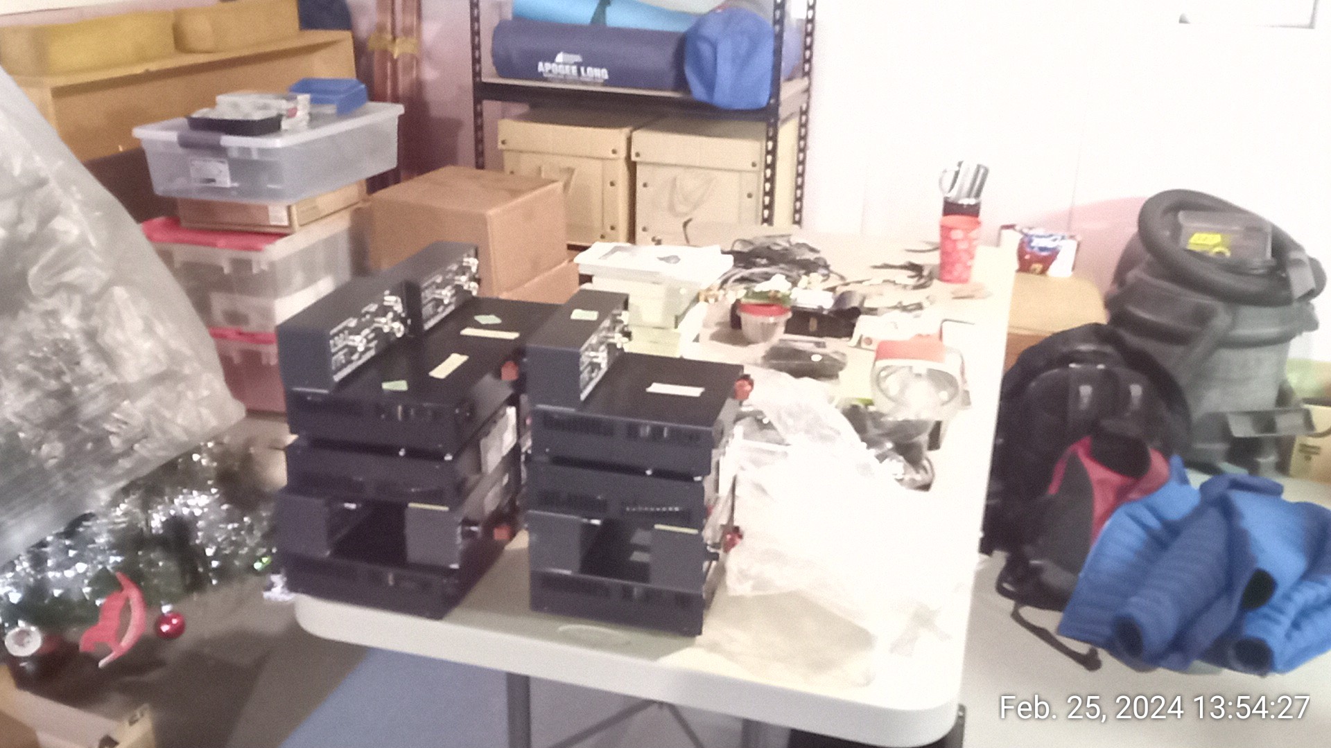 Parts table - power supplies waiting for work and internal parts