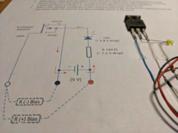 A circuit diagram and example circuit showing a MOSFET component