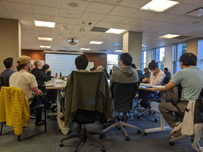 A class of students looking towards the instructor of a VECTOR training course